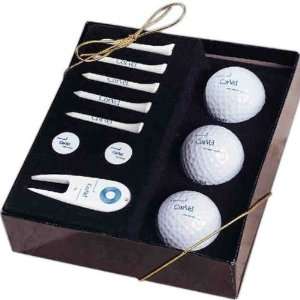   golf balls, five tees, two ball markers and divot tool in gift box