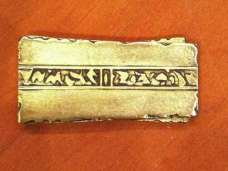  after the bar is the Ingot as shown above. It is 3.5 inches long X 1 