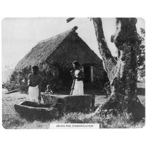  Hollowed tree communication drums,Fiji, Ewing Galloway 