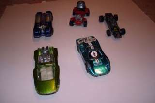 This is a lot of 5 Hot Wheels Redline cars listed below. They are 