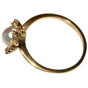   gold 5.4 mm white pearl and 0.06 ct diamond ring. Size 6.5  