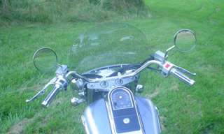 Below are two pictures of a set of these mirrors on a Suzuki Intruder 