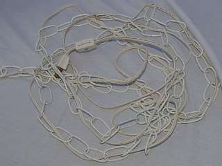 has 12 foot long white swag chain cord with built