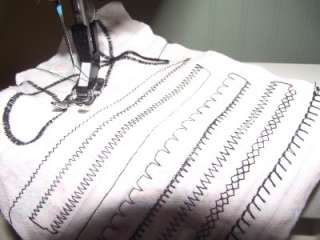   to the basic straight stitch, three widths of zigzag and buttonholes
