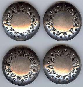   OF FOUR LARGE VINTAGE NAVAJO INDIAN STAMPED STERLING SILVER BUTTONS