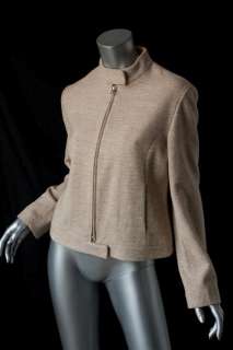  and chic, this little tweed style cropped jacket has a tab colar 