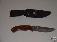 Ozark Trail hunting knife in sheeth w/wood handle  
