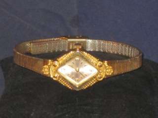 WOMENS CLAREMONT GOLDTONE QUARTZ WATCH DIAMOND SHAPE! DRESS IT UP OR 
