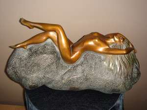 Misha Frid lady resting on rock bronze sculpture  