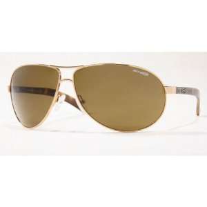 Arnette Lock Down 3049 Sunglasses Gold w/Brown Polarized Lenses 