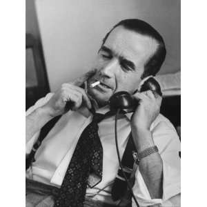  News Commentator, Edward R. Murrow with cigarette in mouth 