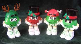 Four M&M Candy Containers   Some are Christmas  