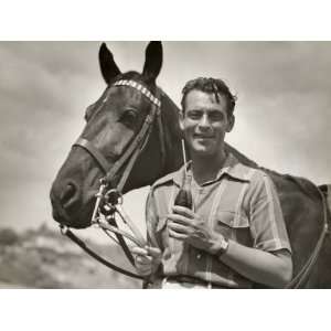  Man Drinking Soda and Holding Horse Reins Photographic 